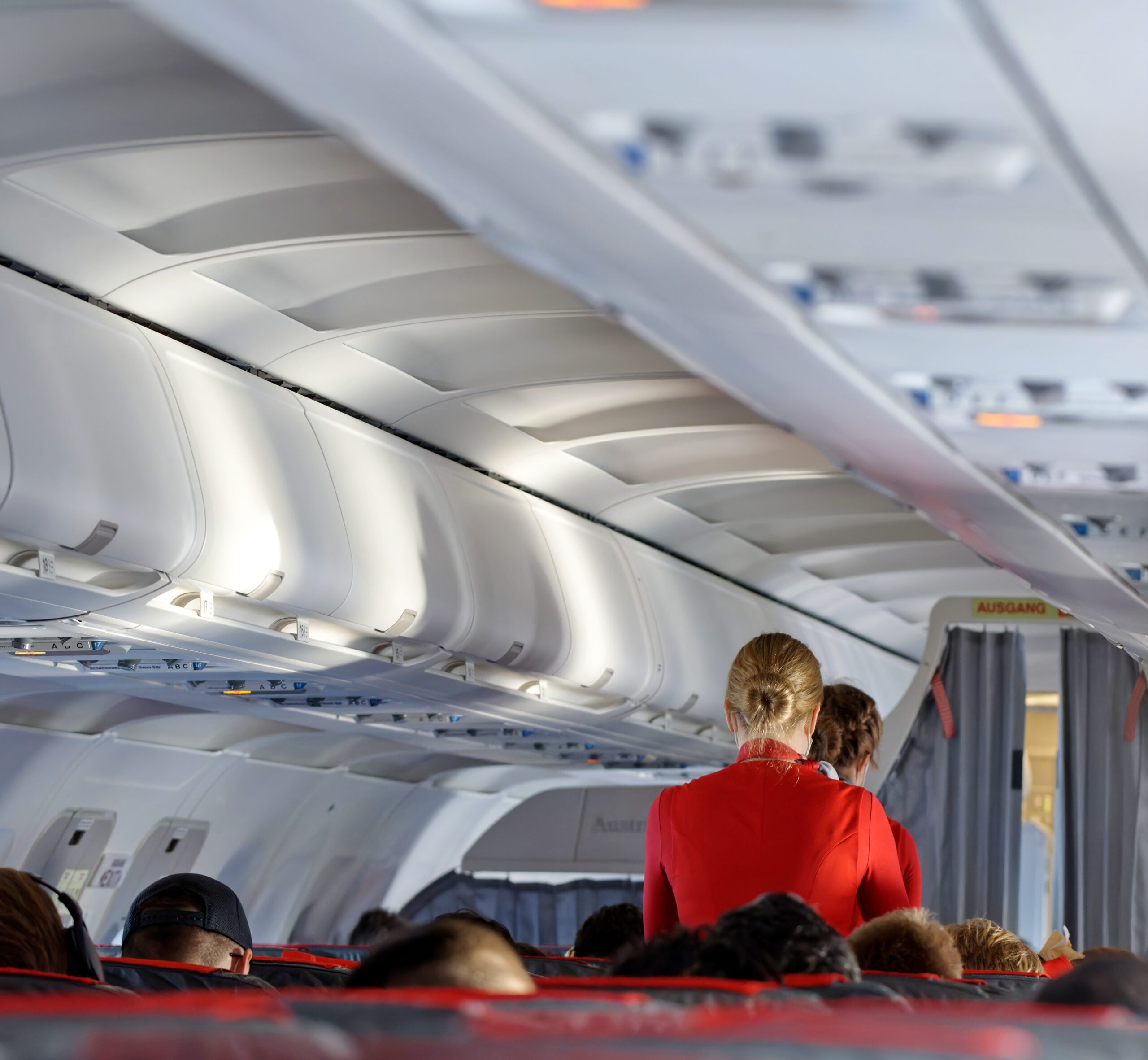 Flight Attendant Holding Ticket